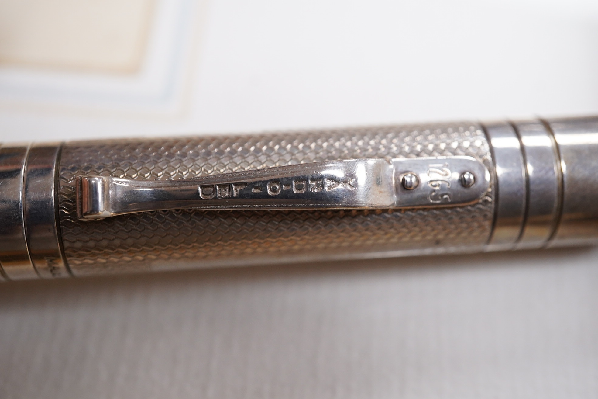 A collection of pens comprising two Sterling Parker fountain pens, one with 14k gold nib, a silver Yard-O-Lead pen, a lizard skin wallet and a Dupont fountain pen. Condition - wallet worn, pens not tested with ink for wo